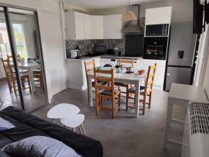 Appartements Mailh- Massibe T2 5 pers climatisation piscine couverte linge de maison inclus parking jardin clos : photos des chambres