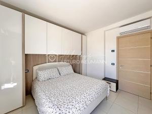 640 - Bellissimo bilocale con portico e giardino al Residence Adamo ed Eva SPIAGGIA WHITE BEACH CLUB inclusa nel prezzo