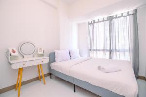 Comfort and Nice 2BR at Tokyo Riverside PIK 2 Apartment By Travelio
