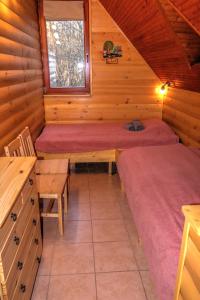 Erdő Mélyén Házikó