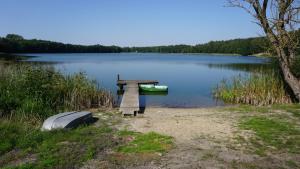 DOM NAD JEZIOREM KUŹNIa