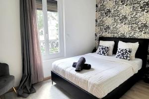 Appartements Le Premium, entre Paris & Disney avec Parking Gratuit : photos des chambres