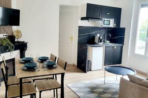 Appartements Le Premium, entre Paris & Disney avec Parking Gratuit : photos des chambres