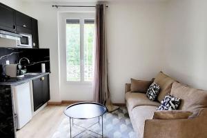 Appartements Le Premium, entre Paris & Disney avec Parking Gratuit : photos des chambres