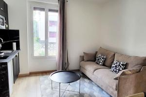 Appartements Le Premium, entre Paris & Disney avec Parking Gratuit : photos des chambres