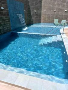 Aline Duque Flat azul 301