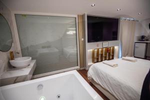Appartements L'experience LOVE ROOM : Appartement 1 Chambre - Vue sur Jardin