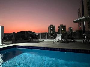 Apart Hotel quarto e sala mobiliado na Enseada do Sua