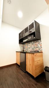 Apartaestudio amueblado en Poblado FRN106 By Roots Rentals