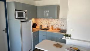 VUE OCEAN avec TERRASSE 30 m2 - 2 CHAMBRES parking privatif et piscine en été