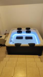 Maisons de vacances Broceliande calme breton, spa, wifi, amazon-disney tv, 4 lits, Freebox revolution,draps, cafe, the : photos des chambres