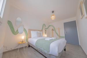 Appartements Le Trianon - Parking Prive : photos des chambres