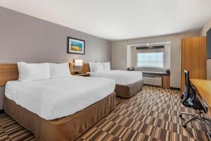 Queen Room with Two Queen Beds room in Microtel Inn & Suites by Wyndham Limon
