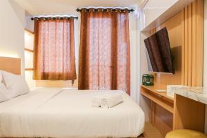 Comfort Living Studio Room at Tokyo Riverside PIK 2 Apartment By Travelio