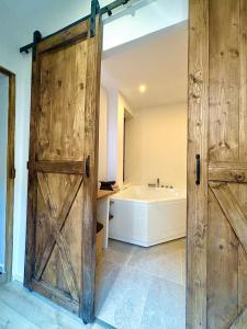 Appartements cinema & balneo privatifs : photos des chambres