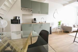 Appartements NEW ! La Casa 2 - renove- Wifi - Vue degagee : photos des chambres