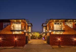 SaffronStays Hobbes - 3BR private pool villa with lawn, family lounge, BBQ nights & deck sit-outs, ideal for celebrations
