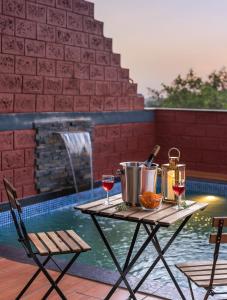 SaffronStays Hobbes - 3BR private pool villa with lawn, family lounge, BBQ nights & deck sit-outs, ideal for celebrations