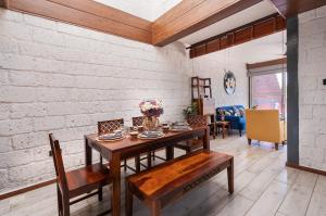 SaffronStays Hobbes - 3BR private pool villa with lawn, family lounge, BBQ nights & deck sit-outs, ideal for celebrations