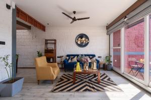 SaffronStays Hobbes - 3BR private pool villa with lawn, family lounge, BBQ nights & deck sit-outs, ideal for celebrations