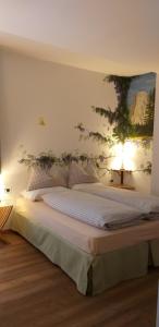 Doppel- oder Zweibettzimmer