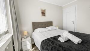 Appartements Homey Belleza - Hypercentre, proche Geneve, proche train et tram : photos des chambres