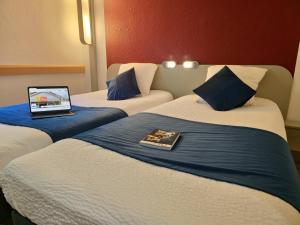 Hotels Cit'hotel Design Booking Evry Saint-Germain-les-Corbeil Senart : Chambre Lits Jumeaux