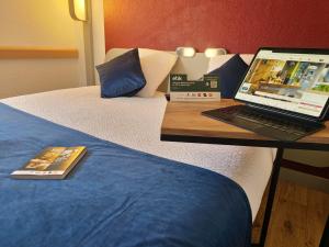 Hotels Cit'hotel Design Booking Evry Saint-Germain-les-Corbeil Senart : photos des chambres