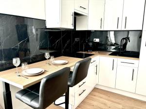 Appartements Eleven Arene BY PRIMO C0NCIERGERIE : photos des chambres