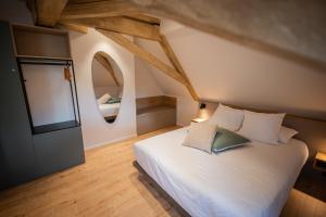 Appartements Le 1552 - Gite de charme - Parking Gratuit : photos des chambres