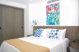 Recien remodelado estudio en la playa, piscina, gimnasio, spa 4D