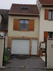 Appartements duplex en maison individuelle de 70 m2avec jardin : photos des chambres