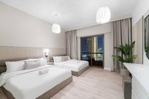 Stunning Sea & Palm View 2BR, Steps from JBR Beach & Waterfront