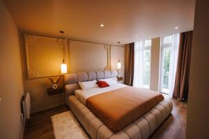 Appartements Eden Room - Luxe, Balneo & Sauna : photos des chambres