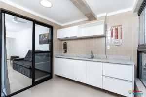 Maravilhoso apto 50 mts da praia com ar cond. - MD02I