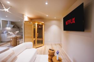 Appartements Eden Room - Luxe, Balneo & Sauna : photos des chambres