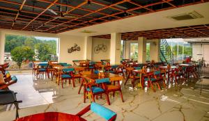 Aachman River and Valley View Resort Dharamshala - A riverside resort with balcony view