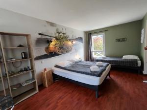 Maisons d'hotes Le Sherman : photos des chambres