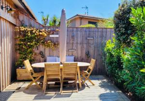 Cocon entre presquîle du Cap Ferret et plages océanes - terrasse - 1 vélo gratuit