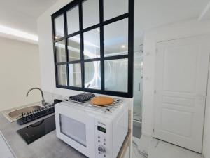 Appartements Studio spacieux Metro 14 Paris : photos des chambres