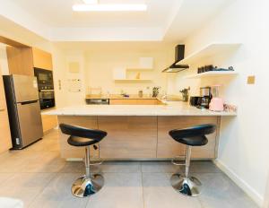 Capital M by BednBeyond Executive Serviced Apartment with Pool