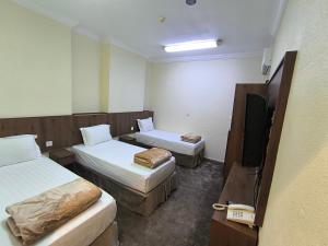 Jawharat dakher hotel فندق جوهرة ذاخر توصيل مجاني من و إلى الحرم