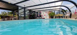 Villas Fare-Kermenezy maison avec piscine chauffee : photos des chambres