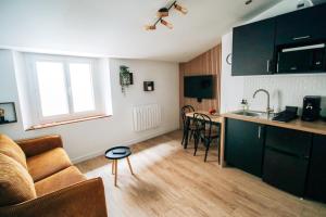 Appartements -Le Toit Terrasse - : photos des chambres