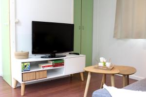 Appartements Le Petit Saint Trophime : photos des chambres