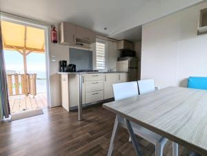 Campings Mobil home 5 personnes vue mer : photos des chambres