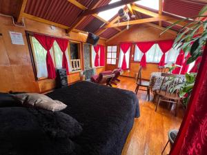 Cabaña El Nogal - La laguna de la Cocha