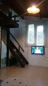 Loft situado a 700 metros da praia de BoiƧucanga
