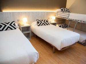 Quadruple Room (2 Adults + 2 Children) room in Hotel Restaurante Cadosa