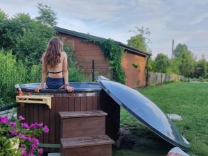 Domek z bala na Podlasiu z balią ogrodową